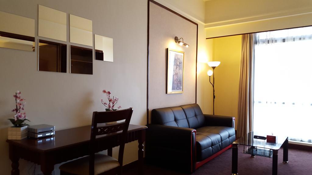 The At Times Square Kl Apartment